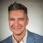 Alex Estevez, editing and branding coach, during a one-on-one video editing and branding session in Los Angeles.